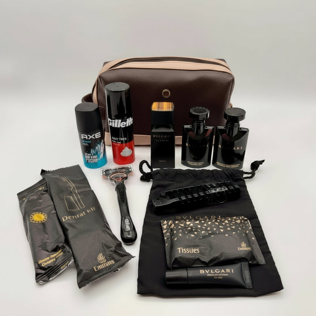 Grooming kit with various items including a bag, bottles, and a razor on a white background